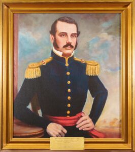 Framed oil portrait of Major P. F. Stevens in a dark blue uniform with gold epaulettes and a red sash